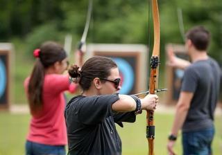 Group archery lesson in progress at Desert Arrow Sports